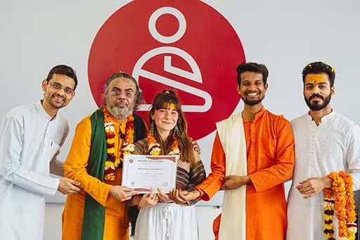 Valentina Catenacci with her Kundalini Yoga Teacher Training Certification at Nirvana Yoga School